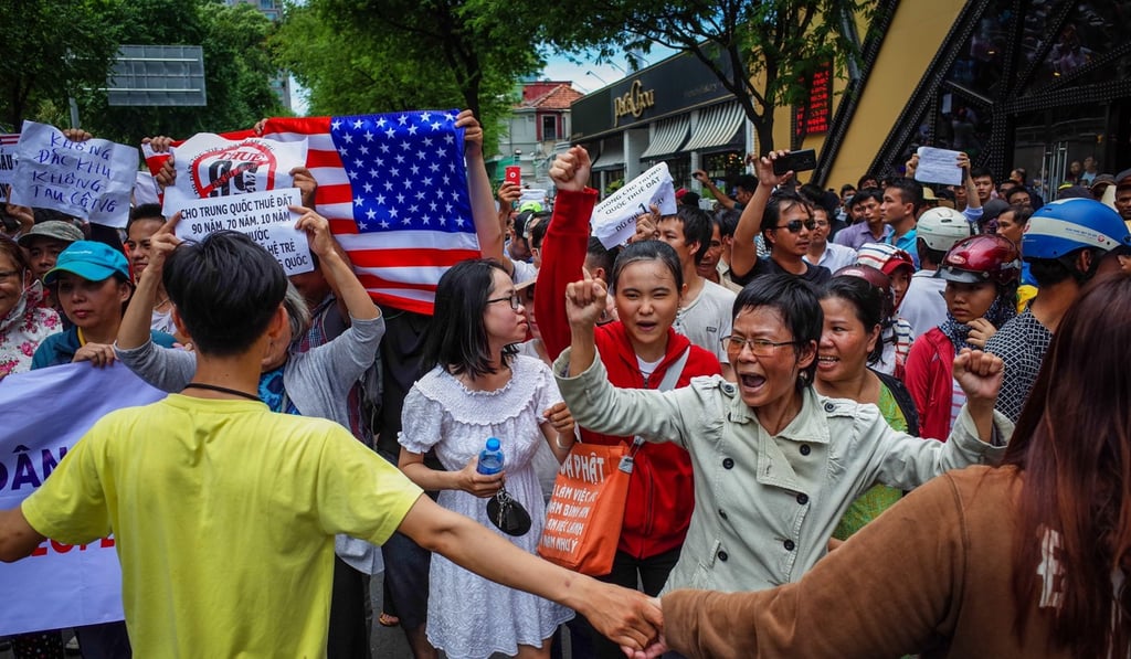 Vietnamese protesters demonstrate against a proposed land leases to foreign companies in Ho Chi Minh Cit on June 10. Photo: AFP