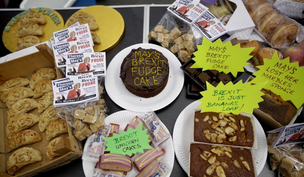 Pies, cakes and fudge with anti-Brexit, pro-EU messages during a protest outside the Houses of Parliament in London. Photo: AP