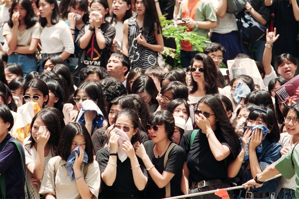 Distraught teenage fans gather to say goodbye to Wong at his funeral. Photo: SCMP