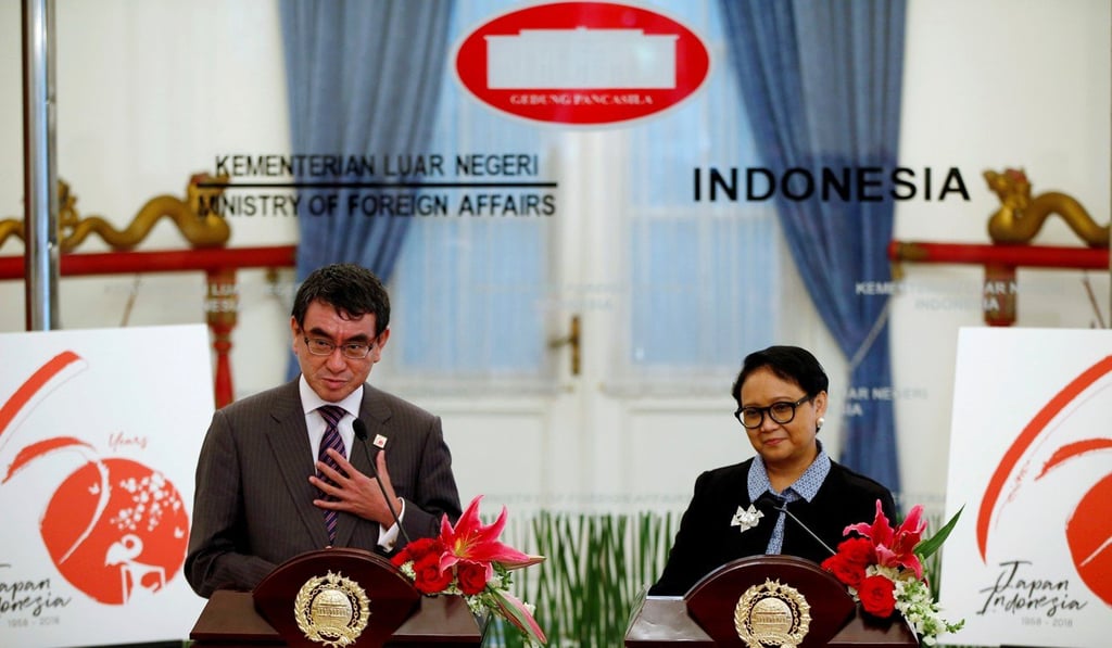 Japan’s Foreign Minister Taro Kono with Indonesia’s Foreign Minister Retno Marsudi following their meeting in Jakarta, Indonesia, on June 25, 2018. Photo: Reuters