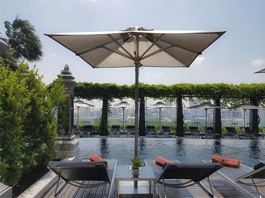 The swimming pool at St Regis Bangkok is stylish and modern.
