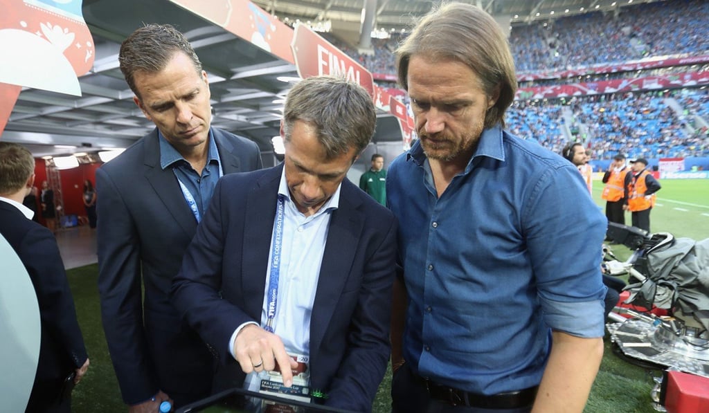 Assistant Germany coach Thomas Schneider uses a tablet PC for the Electronic Performance and Tracking System before the 2017 Fifa Confederations Cup final between Chile and Germany in Saint Petersburg. Photo: Fifa