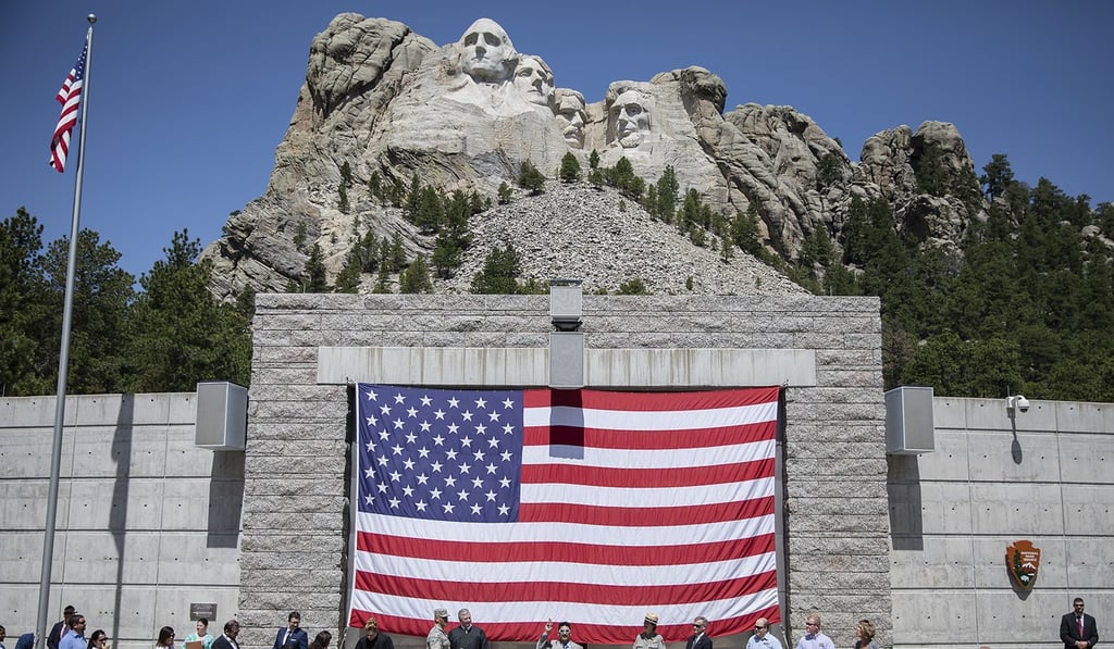 Nearly 170 new Americans take the oath of allegiance on June 14 during a naturalisation ceremony at Mount Rushmore in Keystone, South Dakota. Photo: Rapid City Journal via AP