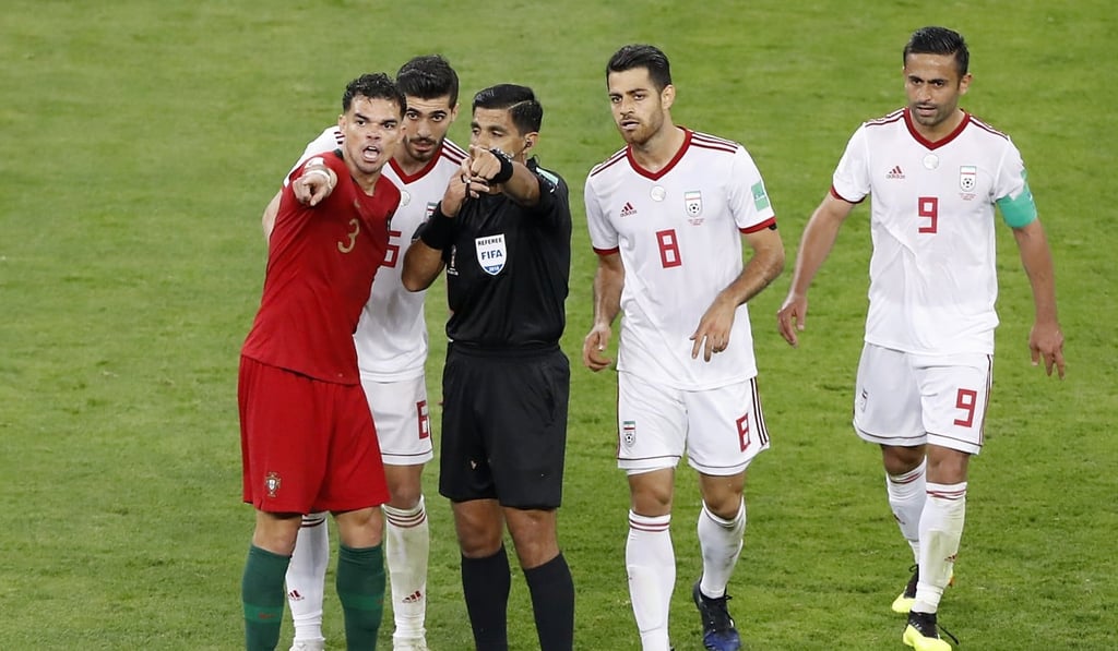 Referee Enrique Caceres was criticised for his use of the VAR review system during the 1-1 draw between Portugal and Iran. photo: AP