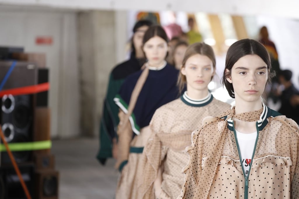 Huge stacks of vintage speakers are held together by fluorescent straps during Sacai’s men’s spring/summer 2019 collection in Paris. Photo: AFP Huge stacks of vintage speakers are held together by fluorescent straps during Sacai’s men’s spring/summer 2019 collection in Paris. Photo: AFP