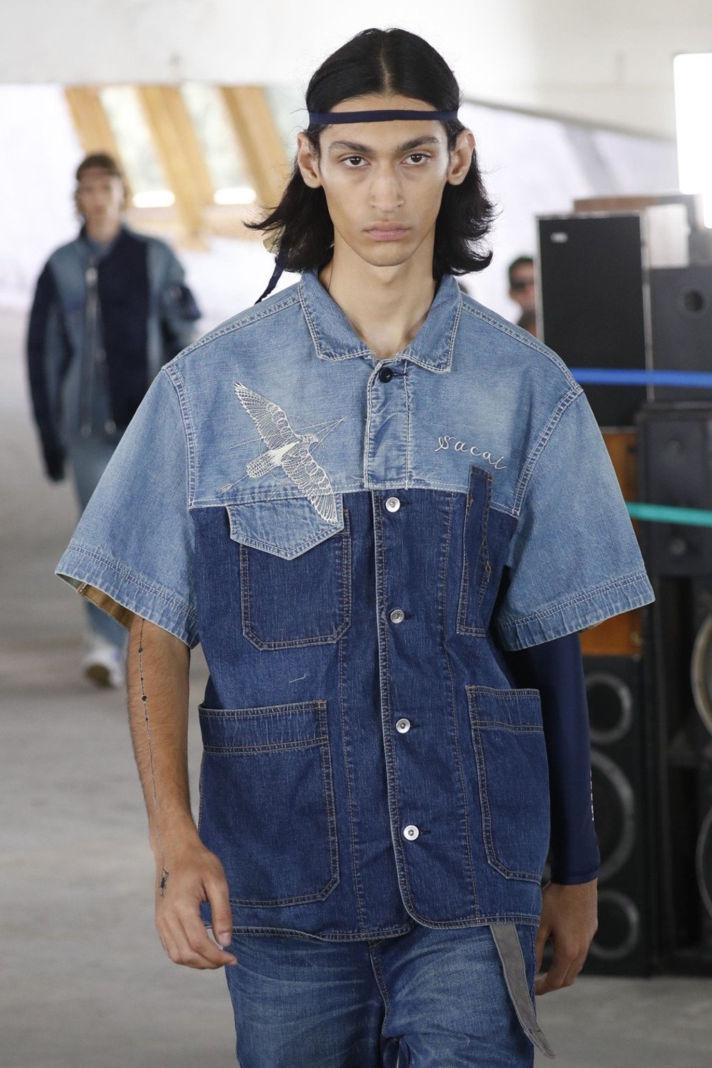 A model presents a Sacai creation during the men’s spring/summer 2019 collection in Paris. Photo: AFP A model presents a Sacai creation during the men’s spring/summer 2019 collection in Paris. Photo: AFP