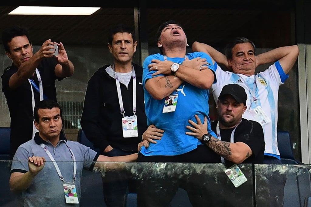 Maradona (centre) celebrates Lionel Messi’s opening goal. Photo: AFP Maradona (centre) celebrates Lionel Messi’s opening goal. Photo: AFP