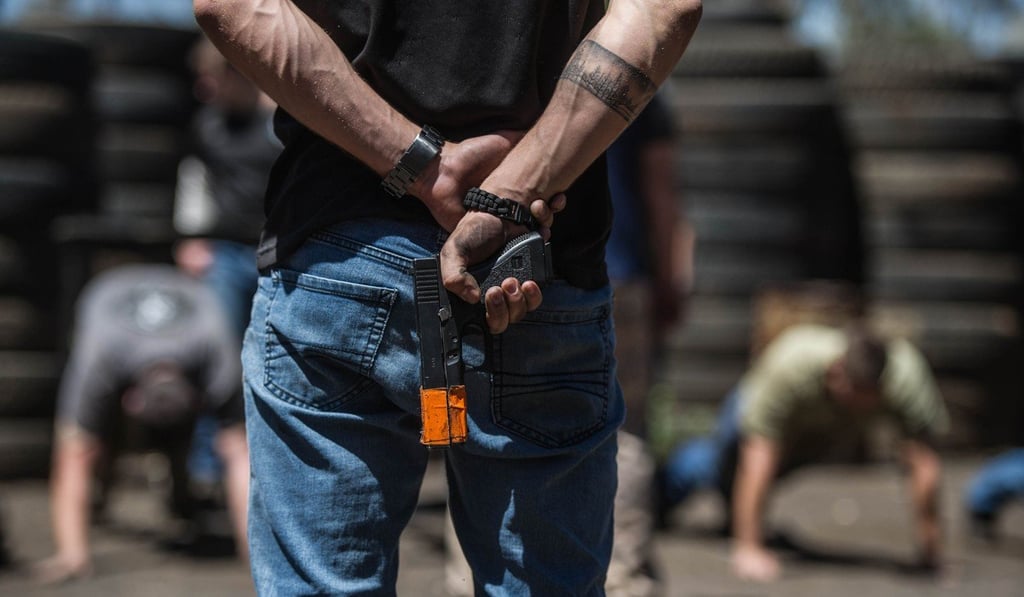 South African farmers and farm workers train in the use of firearms and self defence on October 18, 2017, in Centurion, South Africa. Photo: Agence France-Presse