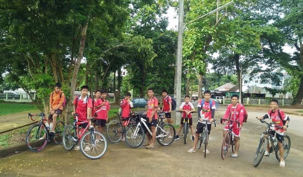 One of the last known photos of a group of boys who are feared trapped in a flooded cave in northern Thailand's Chiang Rai province. Their 25-year-old coach is believed to be with them. Photo: Facebook