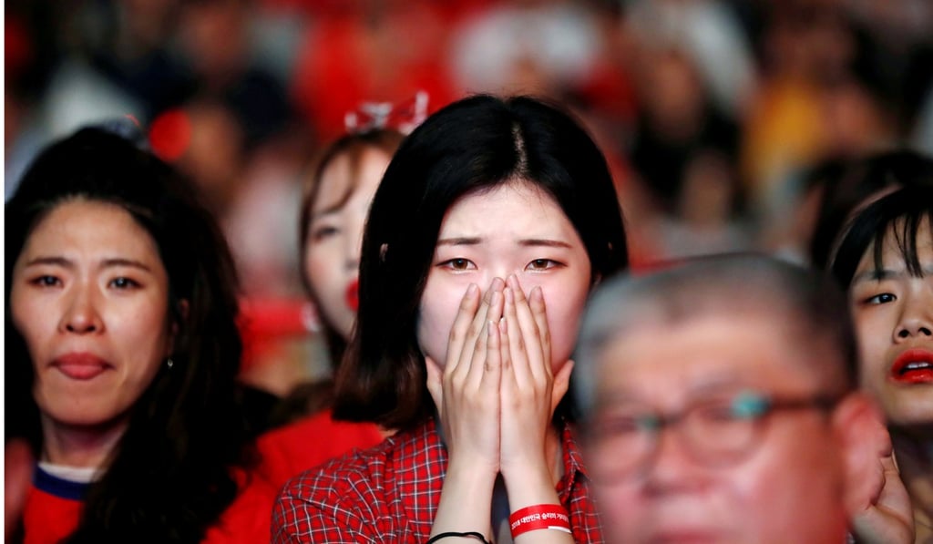 A South Korea fan reacts during the World Cup group F match against Germany. Photo: Reuters