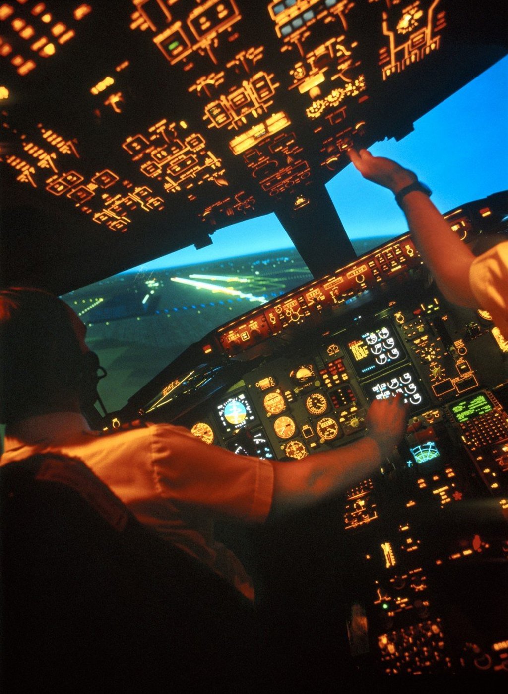 Pilots bring an airliner in to land. Sleep deprivation and irregular scheduled – a common problem for flight crew – may be contributory factors in the elevated rates of cancer Harvard researchers have found in people who fly for a living. Photo: Alamy