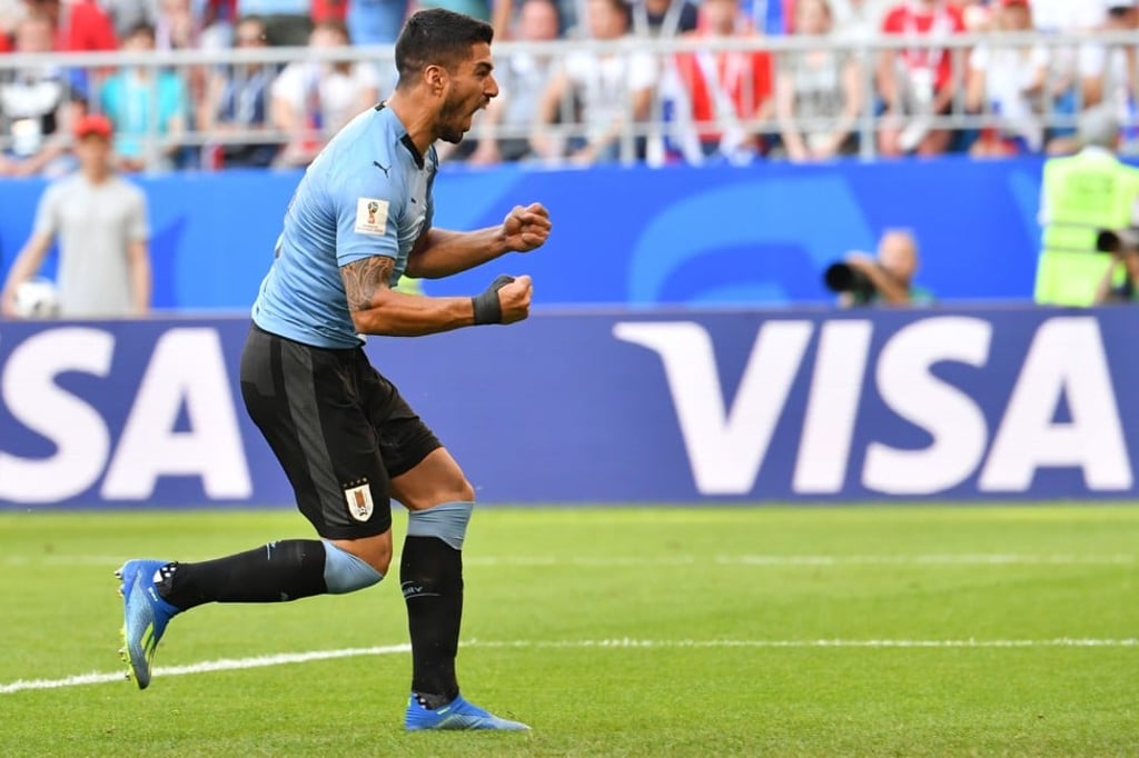 Luis Suarez celebrates Uruguay’s second goal against Russia. Photo: AFP