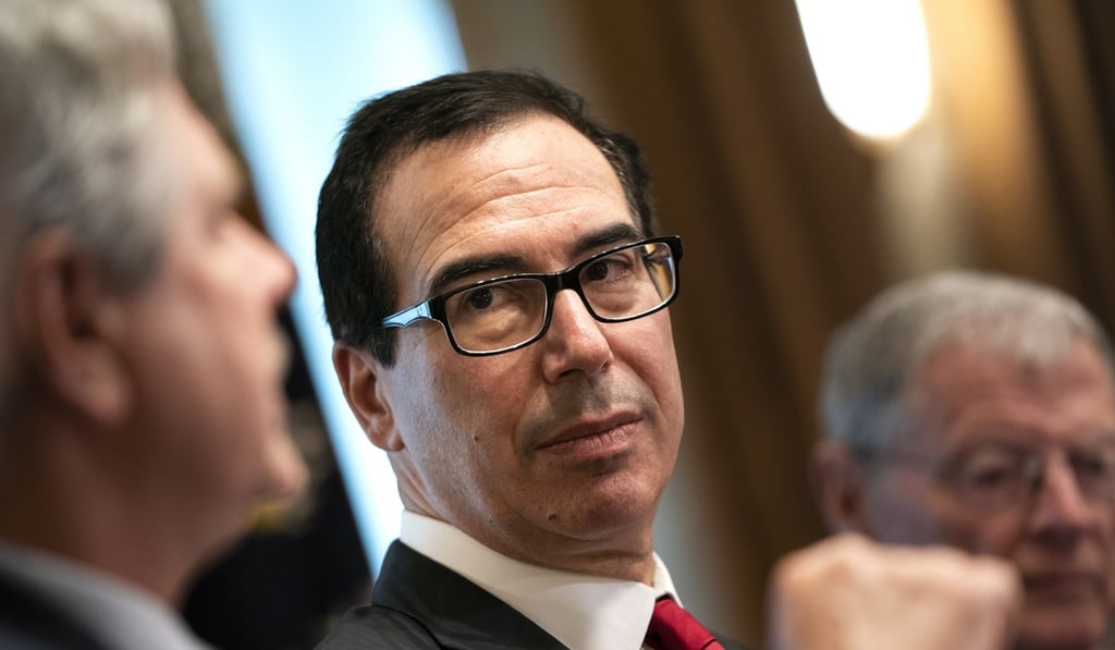 US Treasury Secretary Steve Mnuchin listens to Senator John Hoeven of North Dakota during a meeting in the White House in Washington on June 20. Mnuchin has reportedly urged a less confrontational approach to Chinese investment than the Trump administration has sought, and publicly denied that investment restrictions were aimed at China specifically. Photo: EPA-EFE US Treasury Secretary Steve Mnuchin listens to Senator John Hoeven of North Dakota during a meeting in the White House in Washington on June 20. Mnuchin has reportedly urged a less confrontational approach to Chinese investment than the Trump administration has sought, and publicly denied that investment restrictions were aimed at China specifically. Photo: EPA-EFE