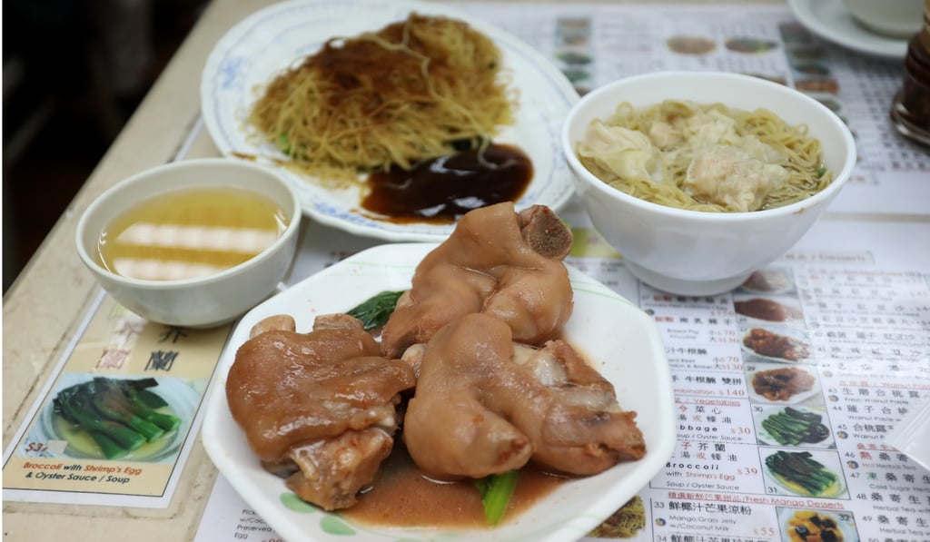 Braised pork knuckle (front), shrimp wonton noodles (right) and noodles with shrimp roe and oyster sauce (back) at Wing Wah. Photo: Tory Ho