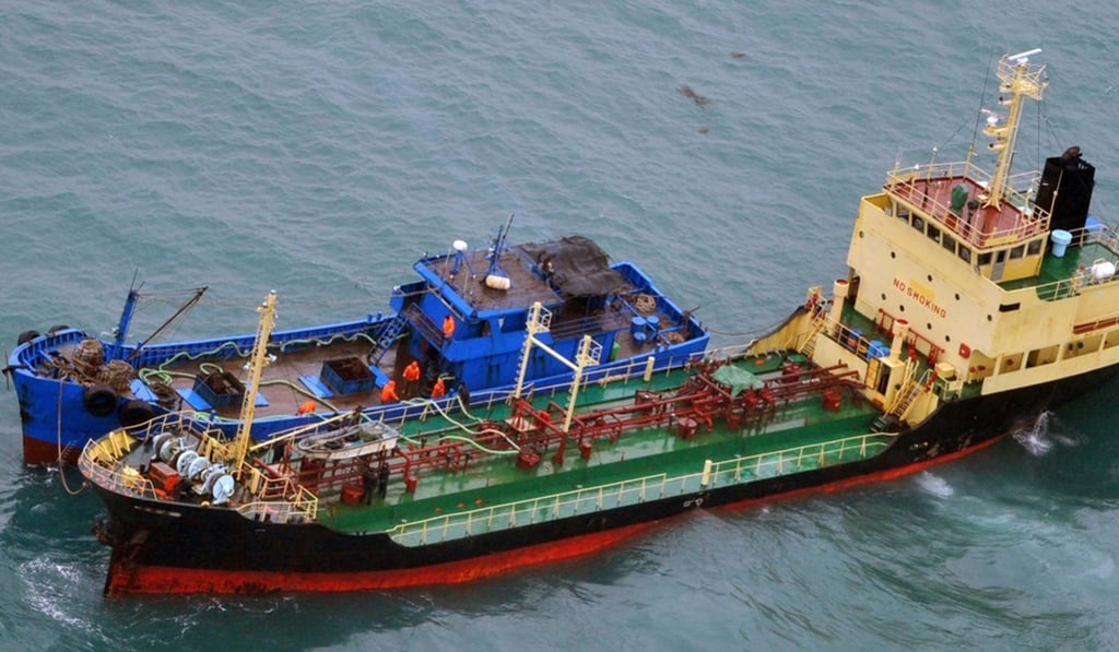 This February 16, 2018 photo released by Japan's Ministry of Defence allegedly shows North Korean-flagged tanker Yu Jong 2 (bottom) and alleged Chinese ship Min Ning De You 078 lying alongside it in the East China Sea. Japan said it believed this was a violation of UN sanctions on North Korea. Photo: Japanese Ministry of Defense via AP