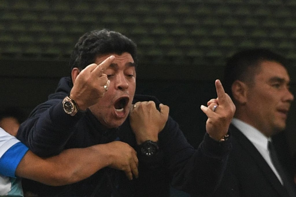 Maradona makes an obscene gesture after Marcos Rojo’s goal. Photo: AFP Maradona makes an obscene gesture after Marcos Rojo’s goal. Photo: AFP