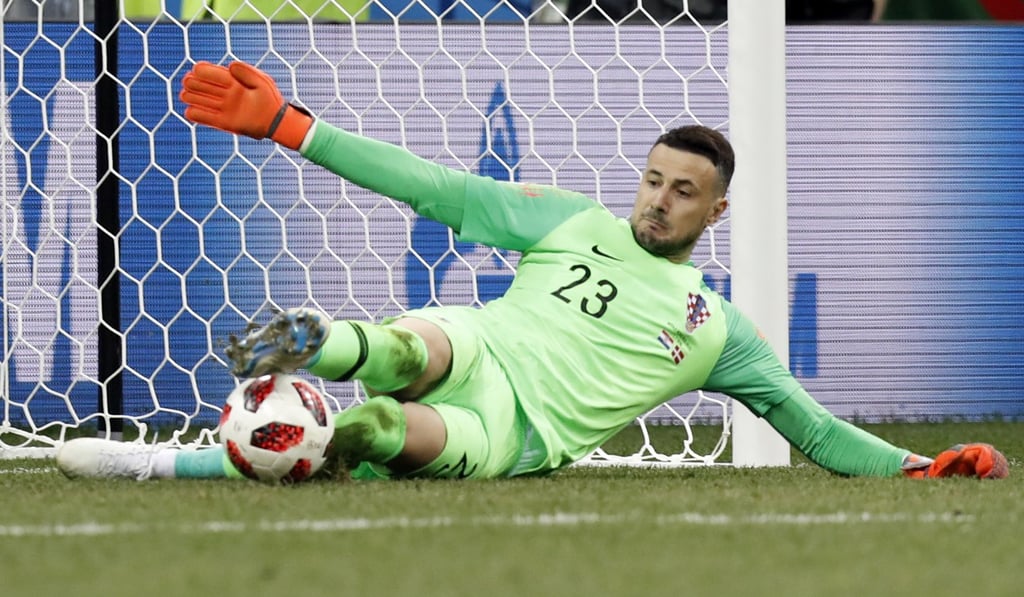 Croatia goalkeeper Danijel Subasic makes a save during the shoot-out. Photo: AP Croatia goalkeeper Danijel Subasic makes a save during the shoot-out. Photo: AP