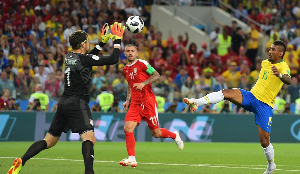 Paulinho opens the scoring against Serbia. Photo: EPA