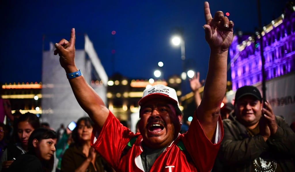 Supporters of Andres Manuel Lopez Obrador celebrate at the Zocalo square in Mexico City. Photo: Agence France-Presse Supporters of Andres Manuel Lopez Obrador celebrate at the Zocalo square in Mexico City. Photo: Agence France-Presse