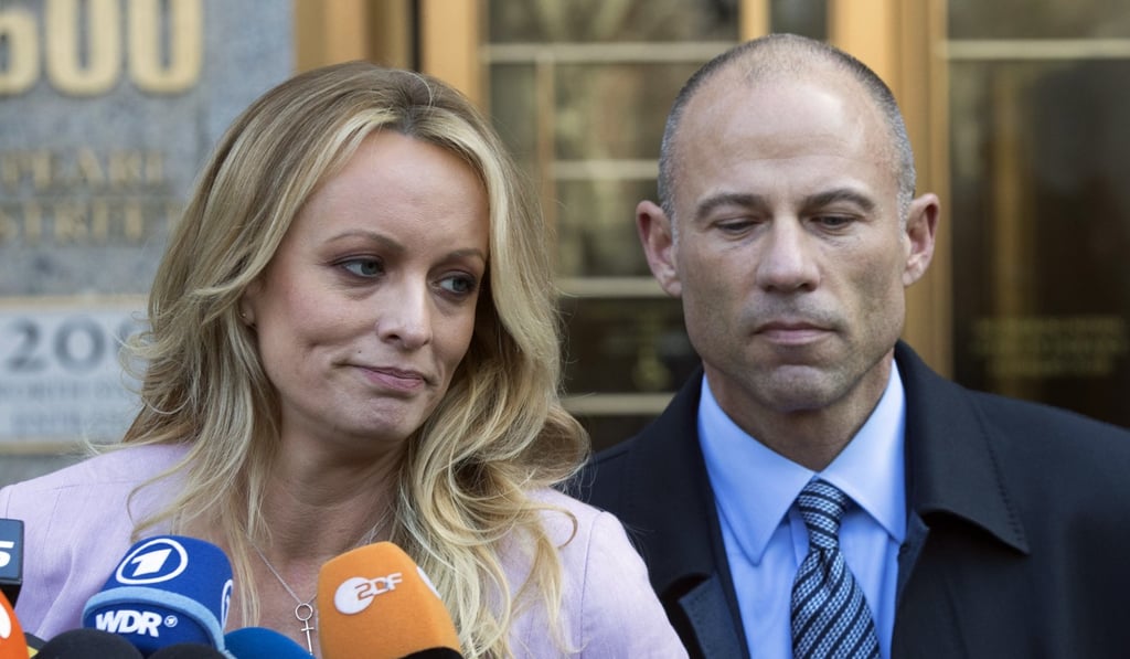 In this April 16, 2018 file photo, adult film actress Stormy Daniels, left, stands with her lawyer Michael Avenatti as she speaks outside federal court, in New York. Photo: AP In this April 16, 2018 file photo, adult film actress Stormy Daniels, left, stands with her lawyer Michael Avenatti as she speaks outside federal court, in New York. Photo: AP