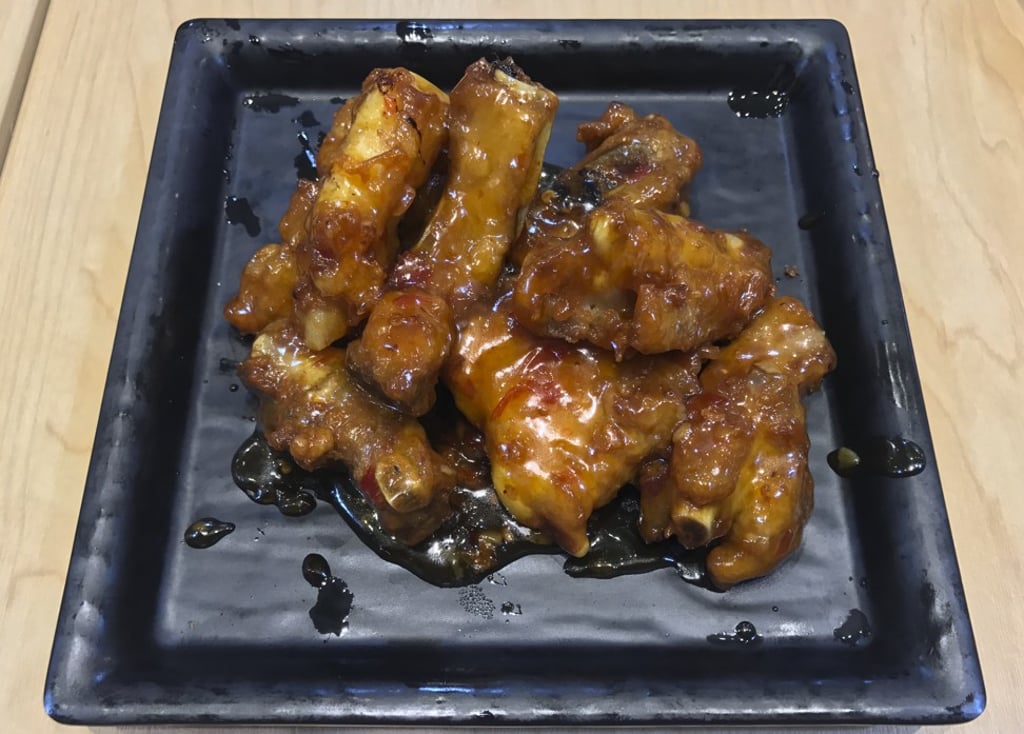 Pork ribs with plum sauce. Photo: Yujing Liu