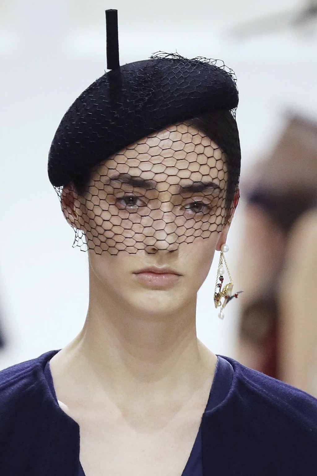 A model wears a veil during Dior’s 2018-2019 autumn/winter haute couture collection fashion show in Paris, on July 2, 2018. Photo: AFP