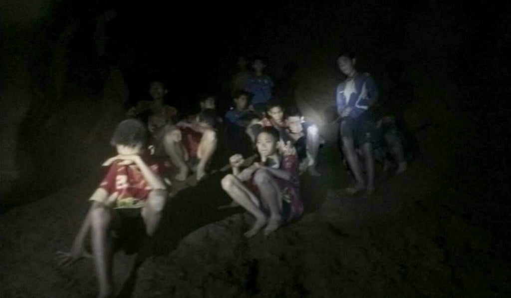 A photo provided by Thai Navy Seals shows the boys in a cave in Mae Sai, Chiang Rai province late Monday. Photo: Xinhua