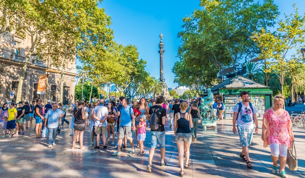 The tourist hordes in La Rambla, a street in Barcelona, Spain, that is popular with visitors and locals alike.