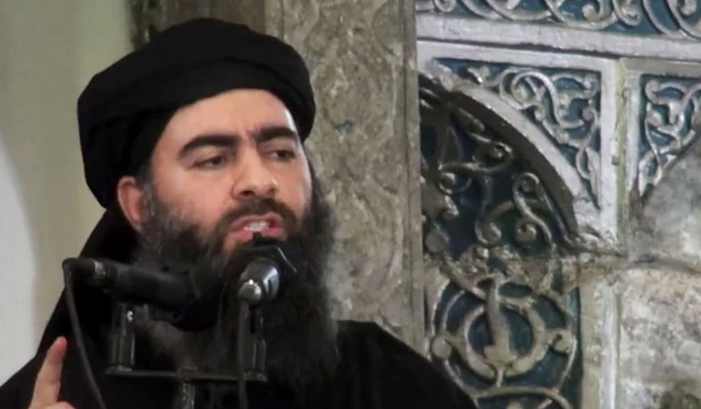 This file image made from video posted on a militant website in, 2014, purports to show the leader of the Islamic State group, Abu Bakr al-Baghdadi, delivering a sermon at a mosque in Iraq during his first public appearance. Photo: AP