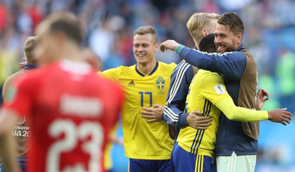 Sweden players celebrate victory. Photo: Xinhua