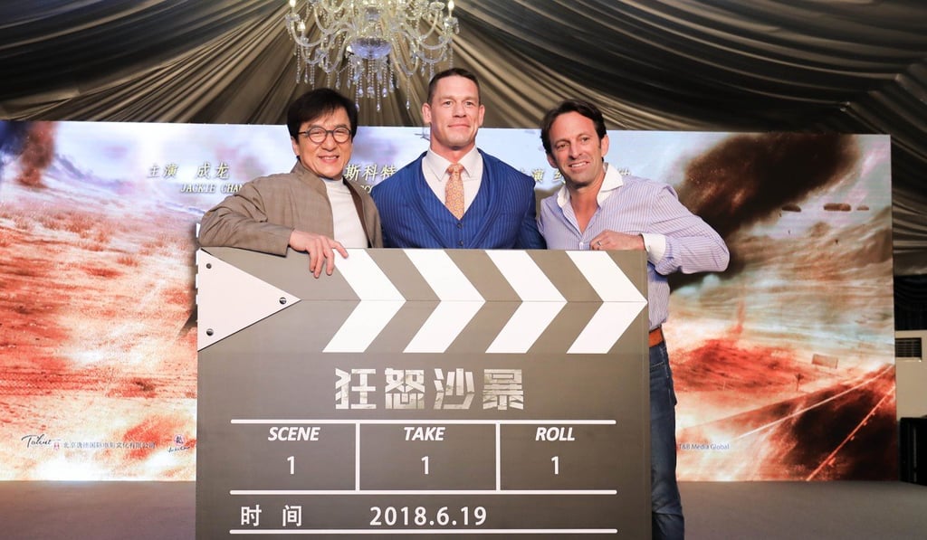 Jackie Chan, John Cena (centre) and director Scott Waugh at the Shanghai promotional event for Project X. Jackie Chan, John Cena (centre) and director Scott Waugh at the Shanghai promotional event for Project X.