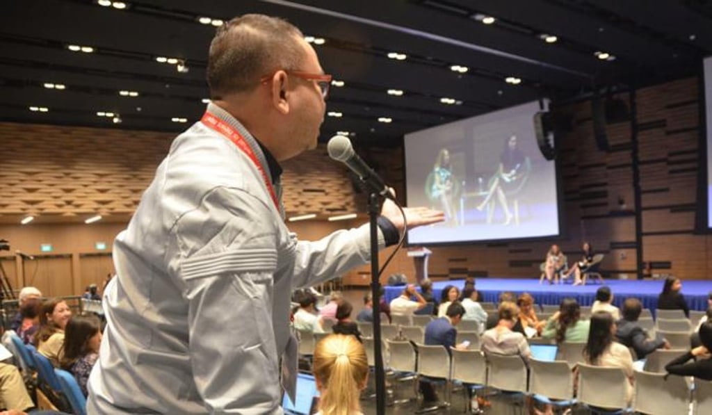 A participant asks a question at the International Media Conference in Singapore last month. Photo: East-West Centre