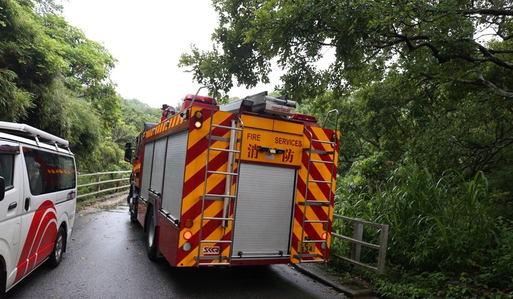 Firemen arrive at Ma On Shan Country Park after Ian Lo, 18, was struck by lightning, on July 2. Photo: Handout