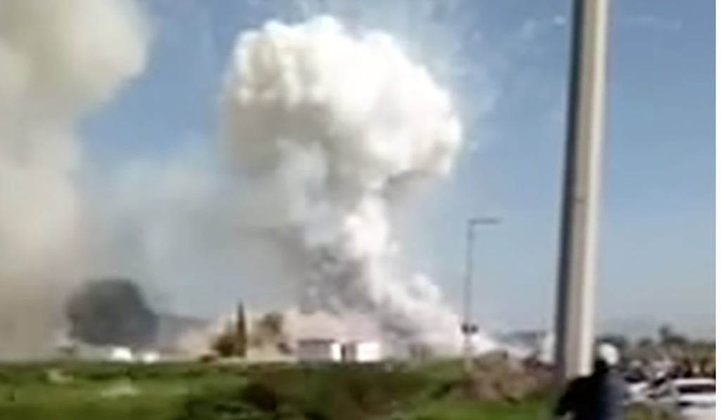 A TV grab released by Noe Montes de Oca shows the second explosion at a firework warehouses in Tultepec on Thursday. Photo: AFP