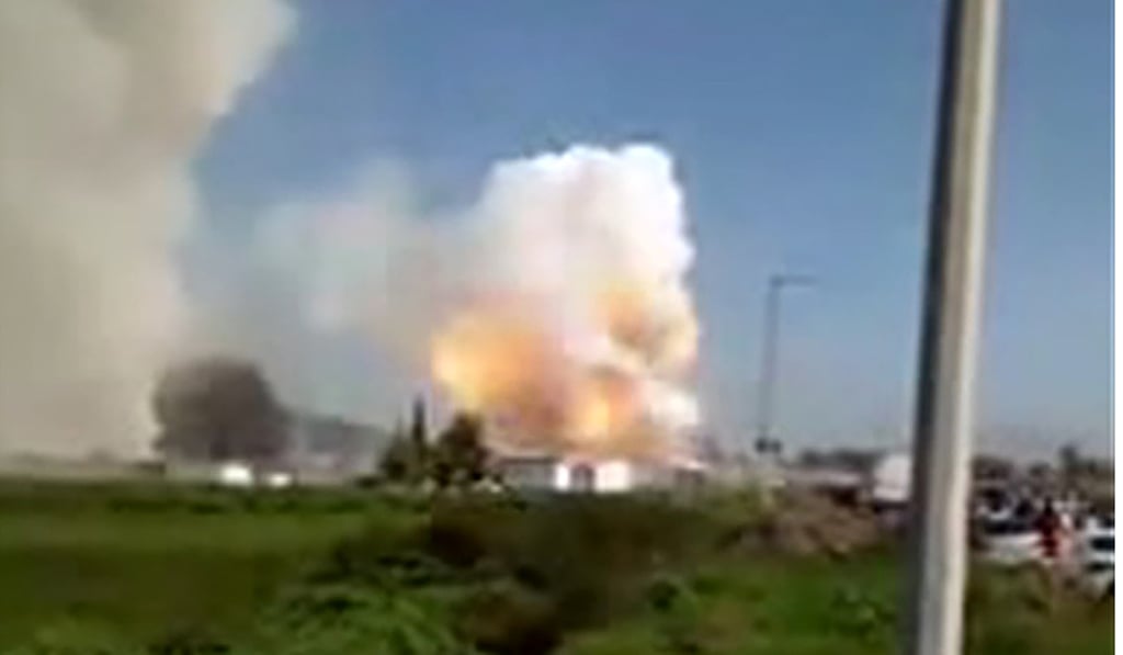 A TV grab released by Noe Montes de Oca shows the second explosion at a firework warehouses in Tultepec on Thursday. Photo: AFP
