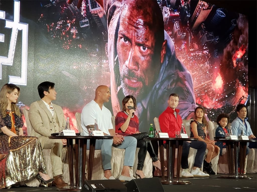 Cast on stage from left: Hannah Quinlivan, Ng Chin Han, Dwayne Johnson, Neve Campbell, Rawson Marshall Thurber, McKenna Roberts, Noah Cottrell and Byron Mann. Photo by: Aydee Tie