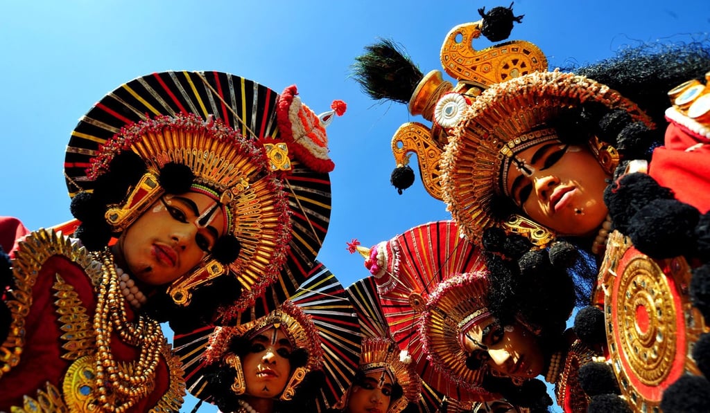 Schoolchildren in costumes prepare to participate in a cultural event for India’s Republic Day parade in the southern city of Bangalore in January 2012, showcasing the country’s diverse cultural heritage. Photo: EPA