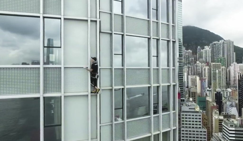 Alain Robert climbs the Hong Kong Four Seasons Hotel for the second time. He last scaled the building in 2008. Photo: Skyscraper Climb
