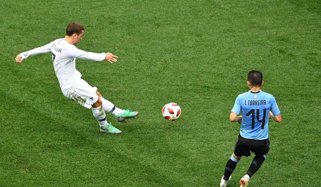 France forward Antoine Griezmann shoots to score his team’s second in the win over Uruguay. Photo: AFP France forward Antoine Griezmann shoots to score his team’s second in the win over Uruguay. Photo: AFP