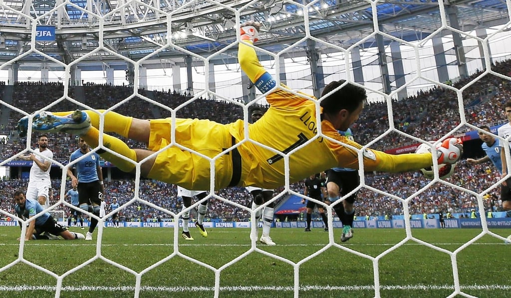 Goalkeeper Hugo Lloris dives to tip out a certain goal in the win over Uruguay. Photo: EPA Goalkeeper Hugo Lloris dives to tip out a certain goal in the win over Uruguay. Photo: EPA