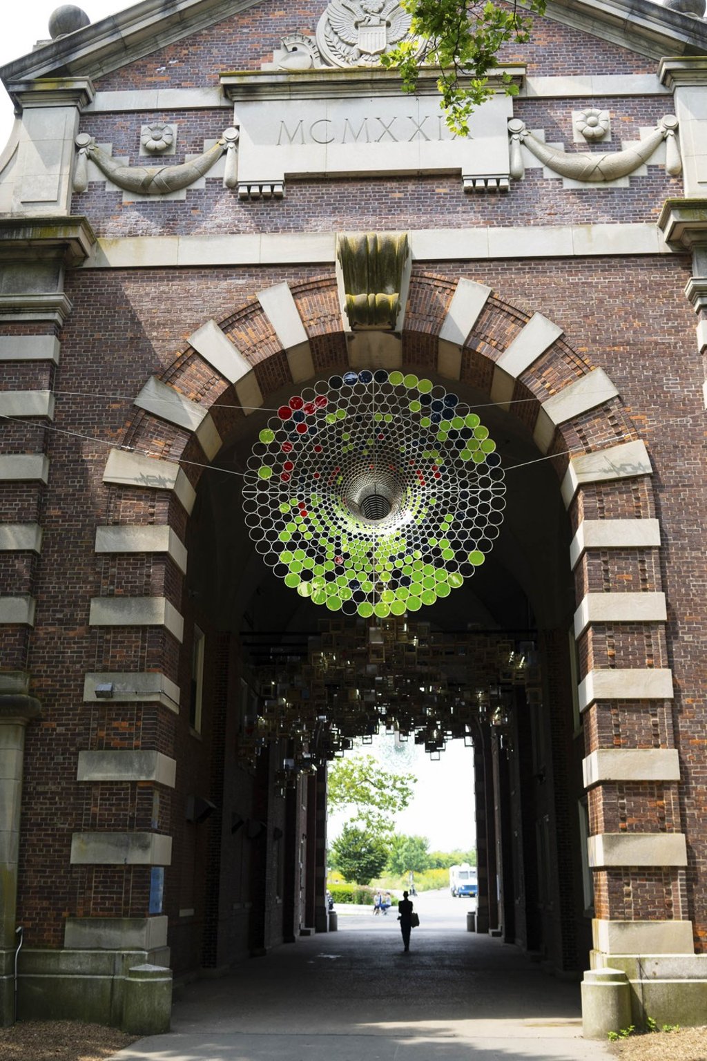 ‘Never Comes Tomorrow’ by Jacob Hashimoto, constructed from hundreds of wooden cubes and two steel funnels in the soaring Liggett Hall archway. Photo: David Gray/Bloomberg