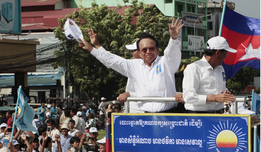 File photo of Cambodia National Rescue Party leader Kem Sokha waving at supporters at a rally in Phnom Penh. Photo: AP