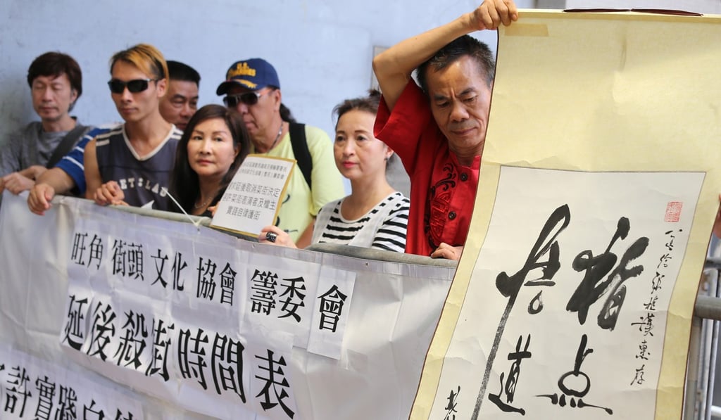 A group of street performers from Mong Kok protest before the council’s meeting. Photo: Dickson Lee