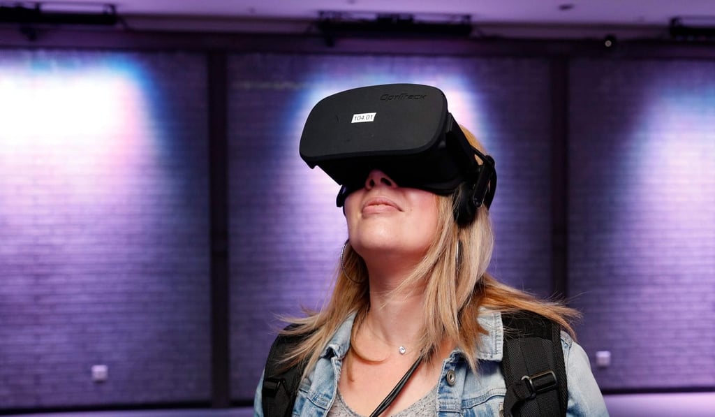 Volunteers who donned VR goggles and tried a virtual reality therapy reported at least a halving of their fear of heights. Photo: AFP