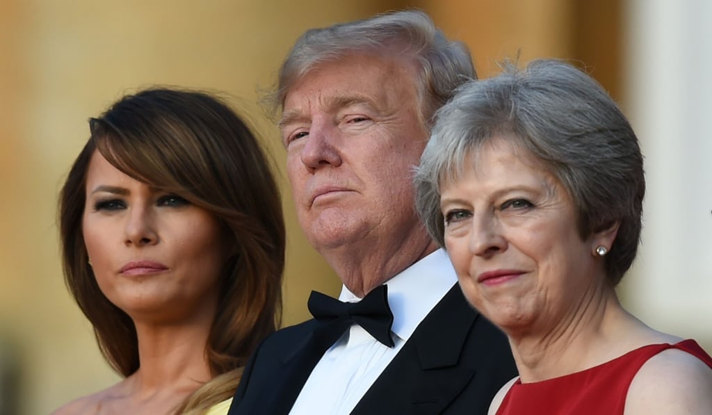 US First Lady Melania Trump, US President Donald Trump and Britain's Prime Minister Theresa May stand on steps of Blenheim Palace, west of London, on Thursday. Photo: Agence France-Presse