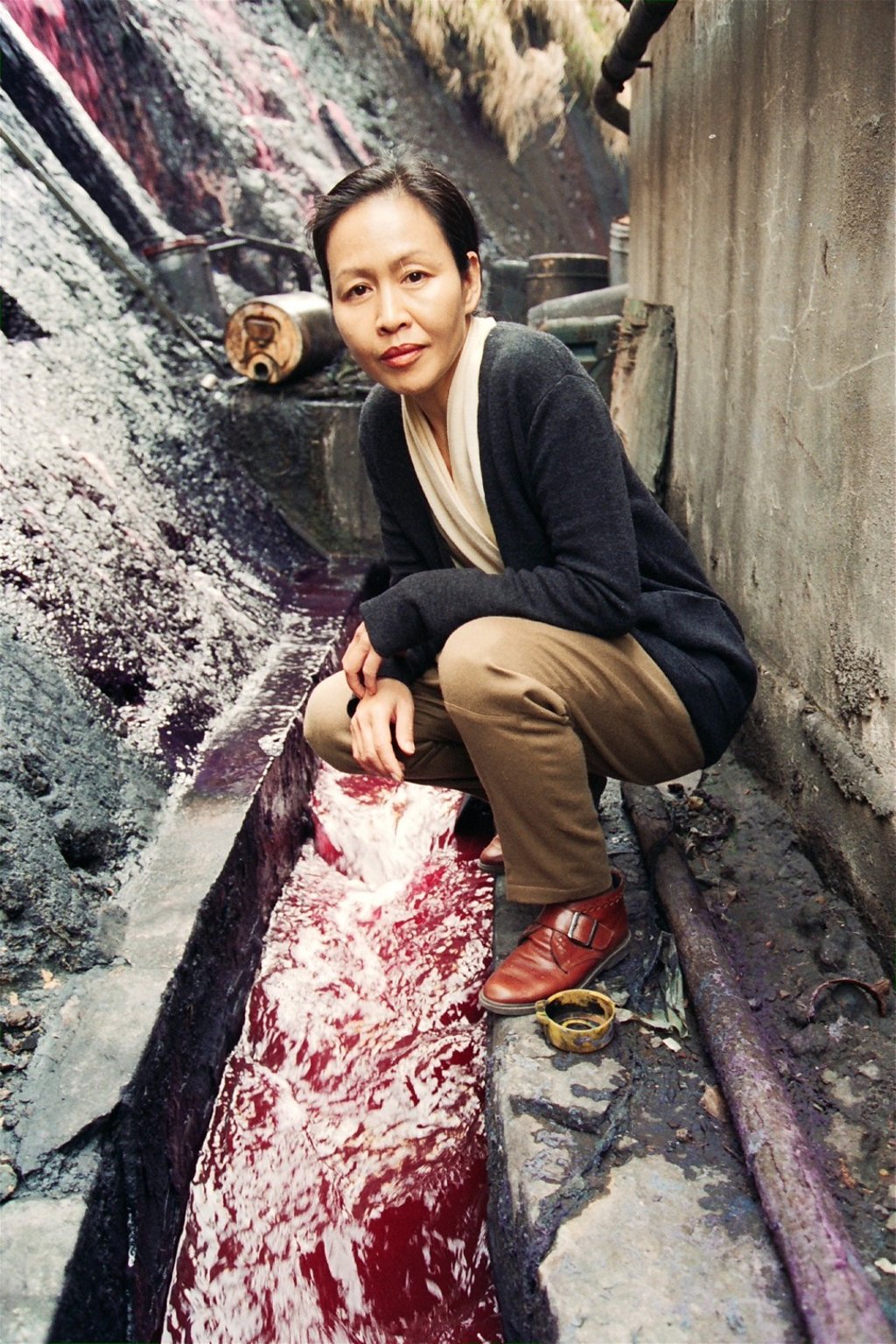 As late as 1994, dye effluent was still pouring into an open drain from a factory in Kwai Chung, pollution that environmentalist Mei Ng Fong Siu-mei (pictured), drew attention to. Picture: SCMP
