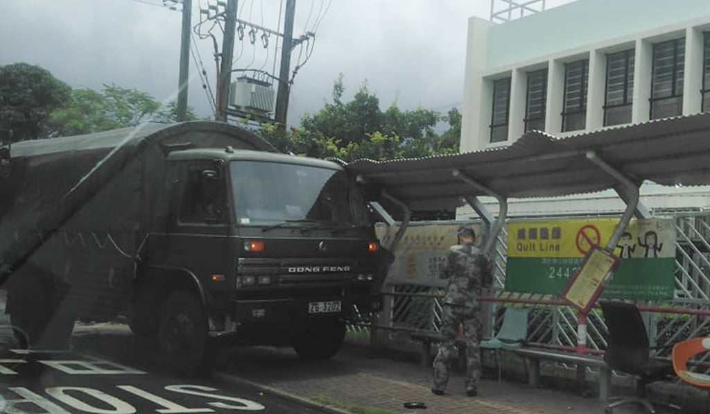 A PLA truck lost control and swerved into a bus stop in Kam Tin on Saturday morning. Photo: Facebook