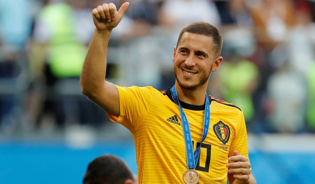 Eden Hazard celebrates with a bronze medal after beating England. Photo: Reuters