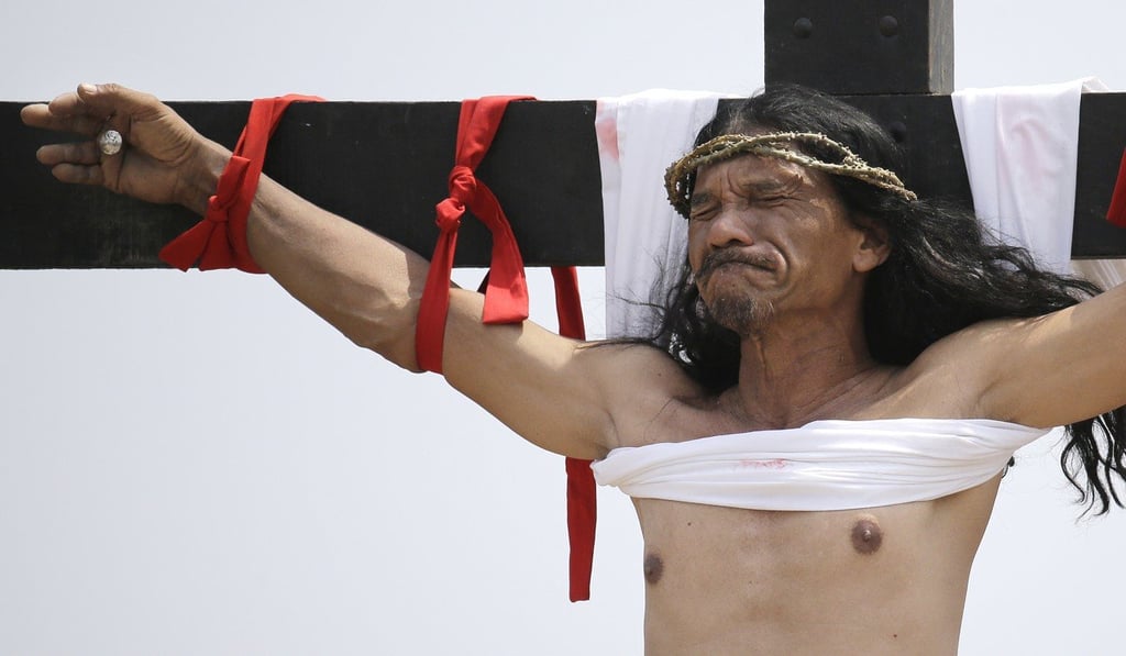 A Filipino re-enacts the sufferings of Jesus Christ as part of Good Friday rituals in March. Photo: AP