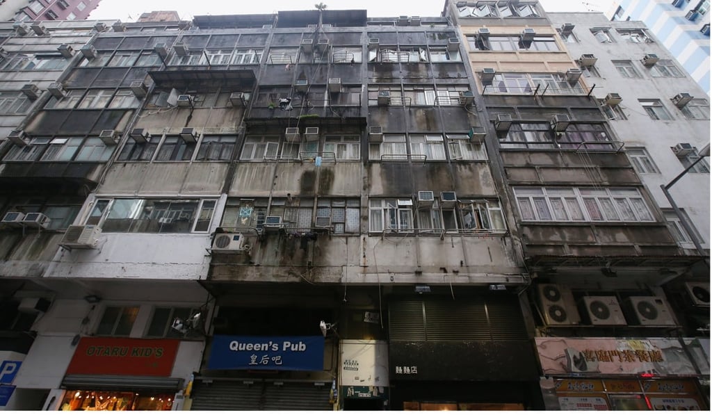Some buildings housed up to six times the number of flats they were designed for. Photo: David Wong Some buildings housed up to six times the number of flats they were designed for. Photo: David Wong